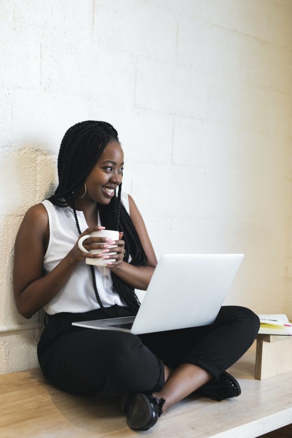 Woman holding coffee cup